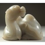 A VERY FINE AND LARGE CHINESE CARVED JADE SEATED CAMEL, base 14cm x 10cm, 12cm high.