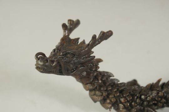 AN ARTICULATED BRONZE OKIMONO OF A DRAGON, 38cm long outstretched. - Image 2 of 3