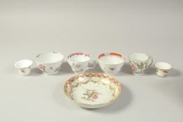 A COLLECTION OF CHINESE PORCELAIN ITEMS, comprising two tea bowls, two tea cups, two small candle