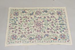 A MID 20TH CENTURY CENTRAL ASIAN SUZANI EMBROIDERED TEXTILE.