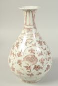 A CHINESE UNDERGLAZE PORCELAIN YUHUCHUN VASE, decorated with flower heads and vines, 33cm high.
