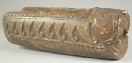 A RARE 17TH-18TH CENTURY INDO PERSIAN CARVED STONE WATER SPOUT, with lion head terminal, 33cm long.