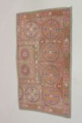 A FINE EARLY 20TH CENTURY CENTRAL ASIAN SUZANI EMBROIDERED TEXTILE, 160cm x 90cm.
