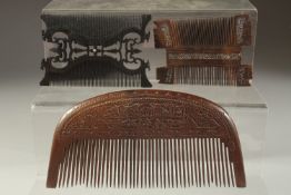 A FINELY CARVEEDD LARGE 19TH CENTURY PERSIAN QAJAR WOODEN COMB, with calligraphy, together with