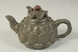 A CHINESE YIXING ARTICHOKE FORM TEAPOT, with impressed mark to base and inner lid.