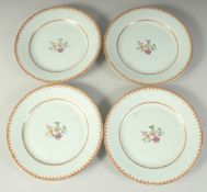 FOUR 18TH CENTURY CHINESE PORCELAIN PLATES, the centre of each with finely painted floral spray,