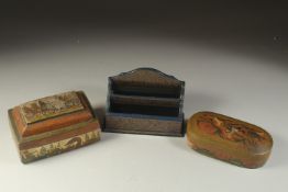 TWO EARLY 20TH CENTURY KASHMIRI LACQUERED BOXES, with calligraphy and figural decoration, along with