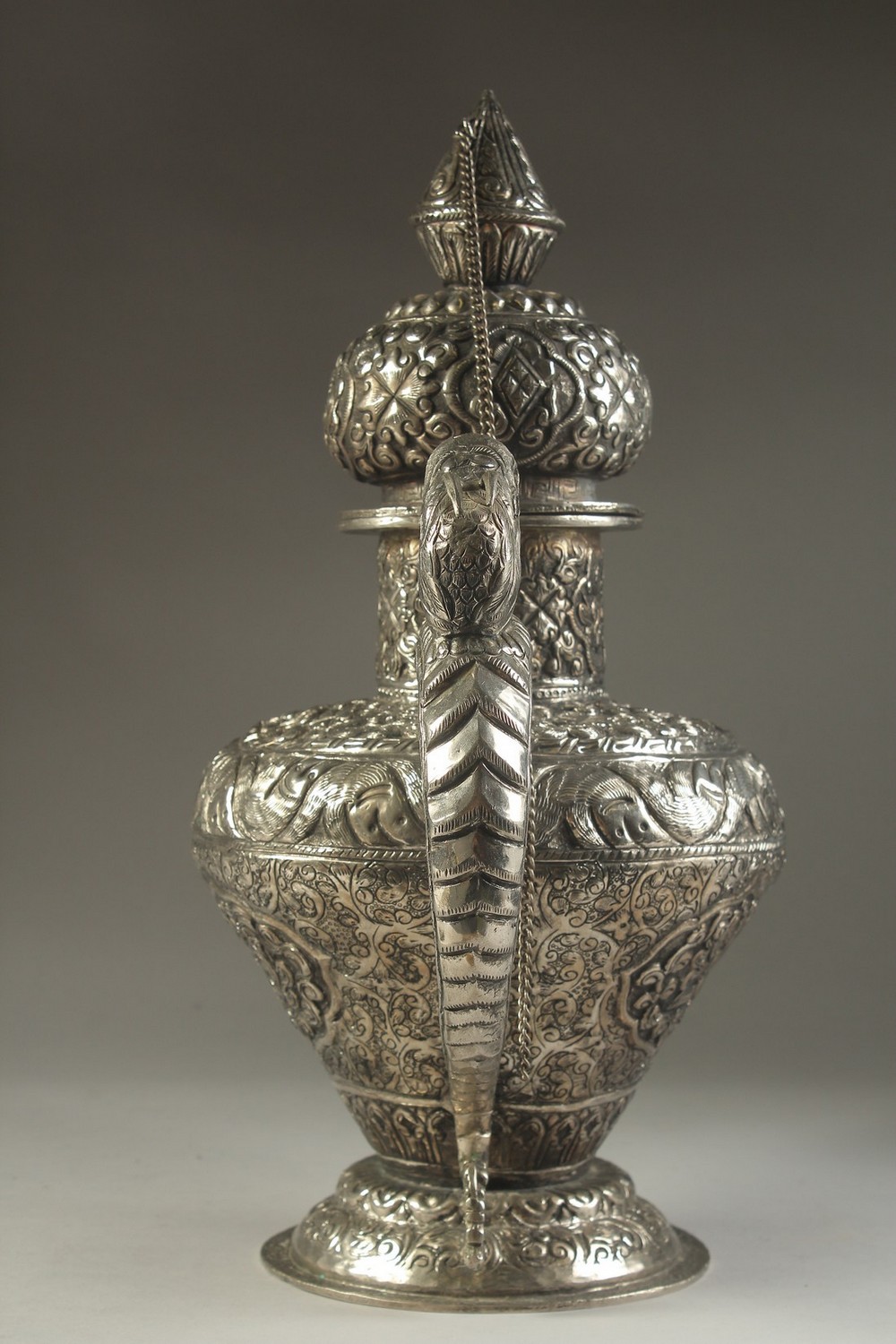 A LARGE CHINESE EMBOSSED AND ENGRAVED WHITE METAL LIDDED JUG, possibly low grade silver, decorated - Image 12 of 14