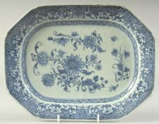 A CHINESE BLUE AND WHITE PORCELAIN RECTANGULAR SERVING DISH, painted with floral sprays, 29.5cm x