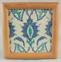 A FINE 16TH-17TH CENTURY IZNIK STYLE OTTOMAN DAMASCUS TILE, framed, tile 25cm square.