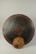 A VERY LARGE AND FINE 19TH CENTURY INDIAN POSSIBLY KASHMIR PAINTED LEATHER SHEILD, along with