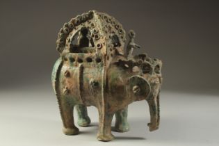 AN IMPORTANT AND RARE 12TH CENTURY KASHAN IRAN LARGE TURQUOISE-GLAZED ELEPHANT AND RIDERS, from a