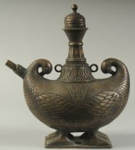 A FINE AND LARGE INDIAN BOAT SHAPED BRASS LIDDED EWER, with two duck shaped terminals to the side,