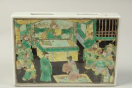 A CHINESE FAMILLE VERTE PORCELAIN BRICK, decorated with a ceremonial scene, 21cm x 15cm.