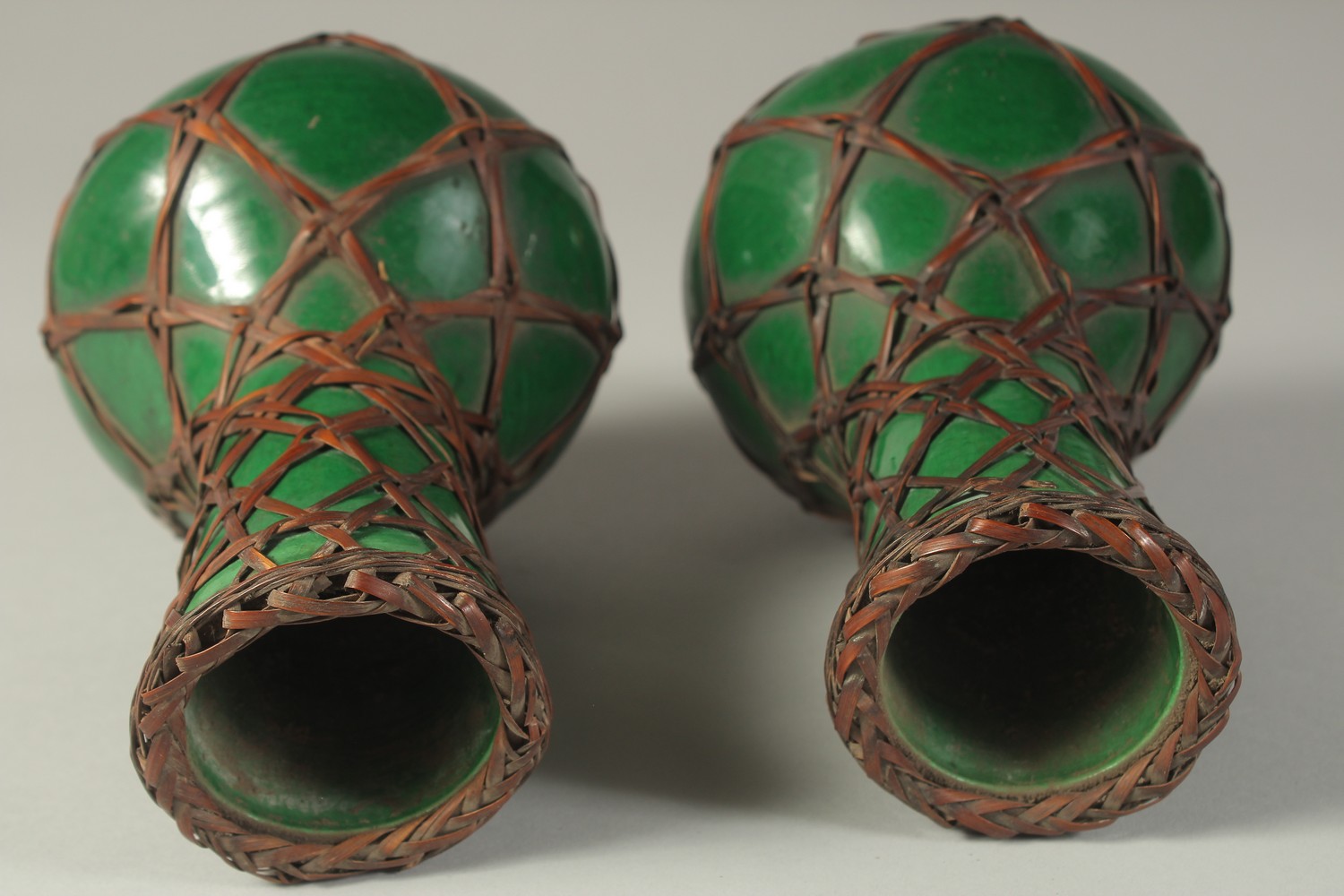 A PAIR OF JAPANESE AWAJI WARE GREEN GLAZED PORCELAIN VASES, with woven bamboo overlay, each with - Image 3 of 4