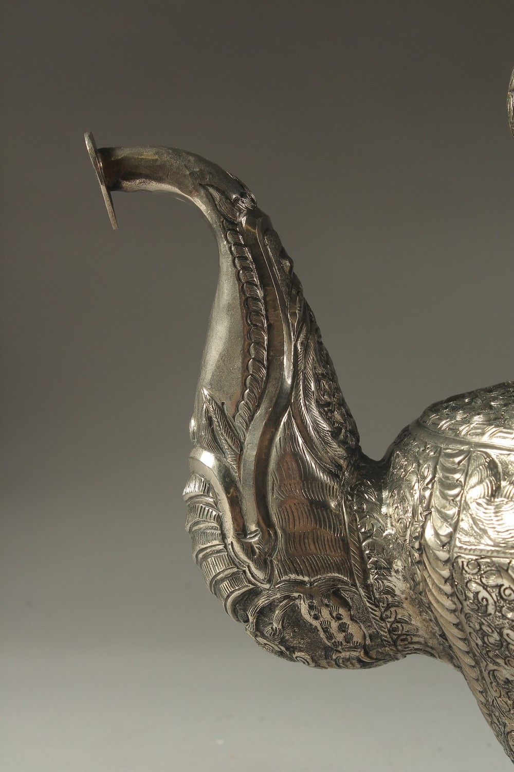 A LARGE CHINESE EMBOSSED AND ENGRAVED WHITE METAL LIDDED JUG, possibly low grade silver, decorated - Image 4 of 14