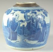 A LARGE CHINESE BLUE AND WHITE PORCELAIN JAR, painted with immortals in a garden, the rim with key