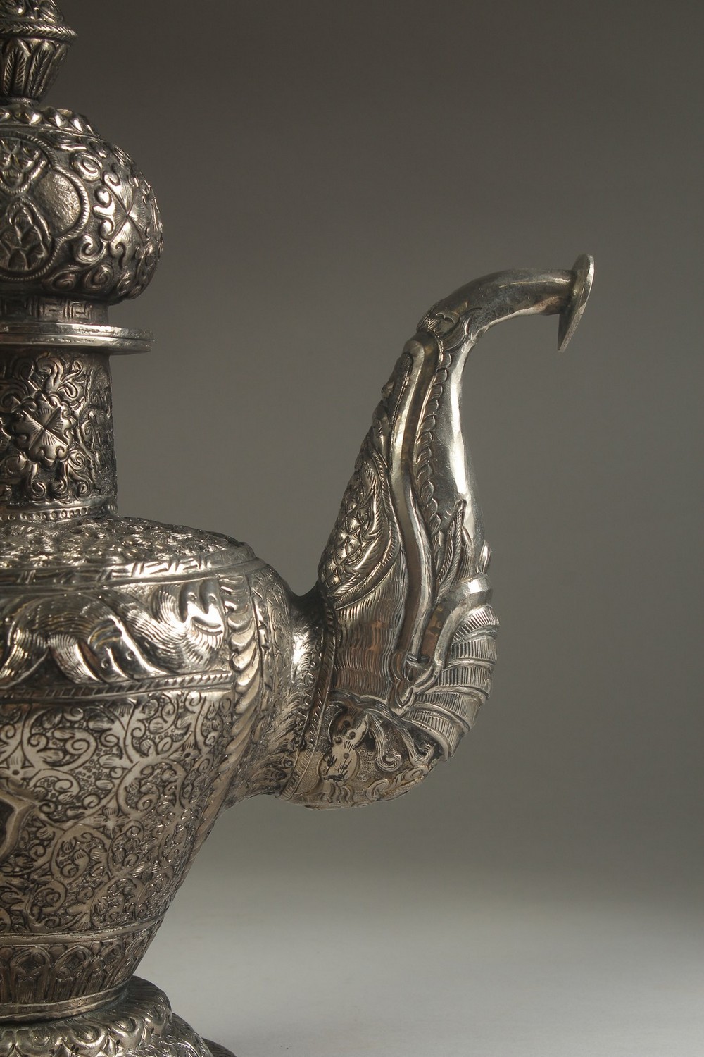 A LARGE CHINESE EMBOSSED AND ENGRAVED WHITE METAL LIDDED JUG, possibly low grade silver, decorated - Image 10 of 14
