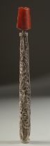 A 19TH CENTURY OTTOMAN TURKISH FILIGREE SILVER HOOKER PIPE WITH AMBER MOUTH PIECE, 16cm long.