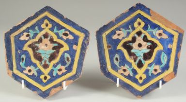 A PAIR OF 15TH CENTURY PERSIAN OR CENTRAL ASIAN TIMURID GLAZED POTTERY TILES, 18.5cm at widest