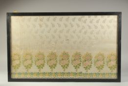 A FINE 19TH CENTURY INDIAN SILK EMBROIDERY, framed and glazed, 85cm x 52cm overall.
