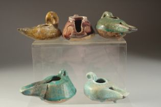 A COLLECTION OF FIVE 12TH-13TH CENTURY PERSIAN GLAZED POTTERY OIL LAMPS, (5).
