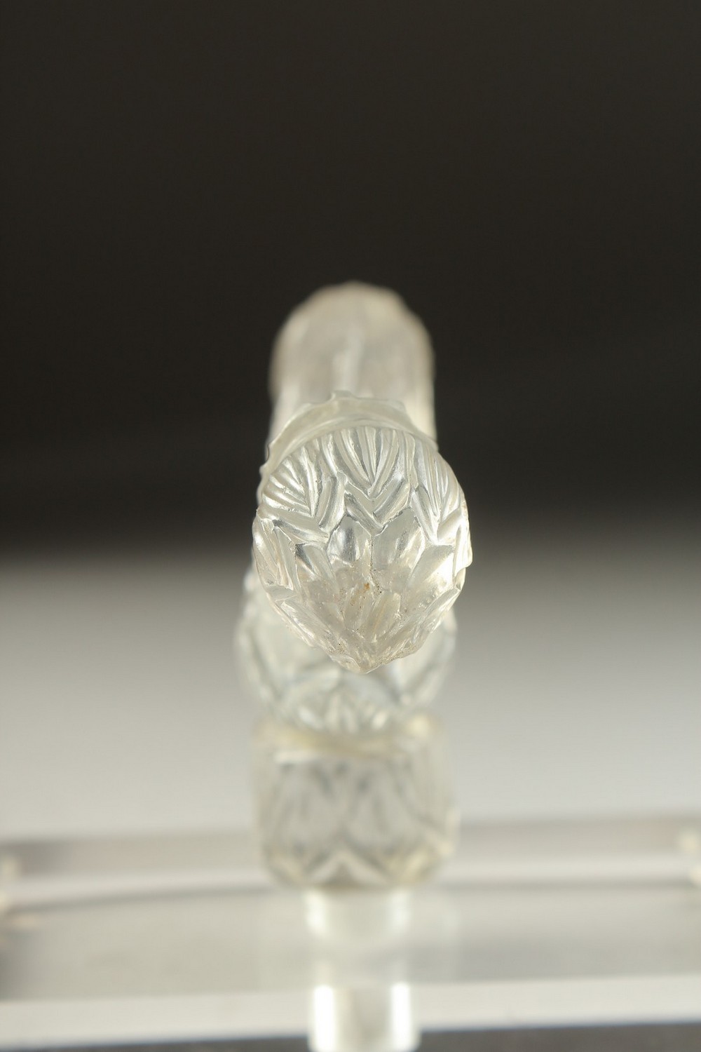 A FINELY CARVED 19TH CENTURY MUGHAL INDIAN ROCK CRYSTAL CRUTCH HANDLE, mounted on a later perspex - Image 5 of 5