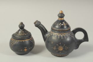 A RARE TURKISH BLACK TOPHANE COFFEE POT AND SUGAR BOWL, (2).