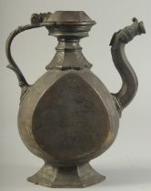 A FINE 17TH-18TH CENTURY MUGHAL INDIAN BRASS EWER, with a dragon shaped spout, 27.5cm high.
