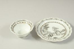 A CHINESE QIANLONG PERIOD PORCELAIN CUP AND SAUCER DISH, each painted with a male and female figure,