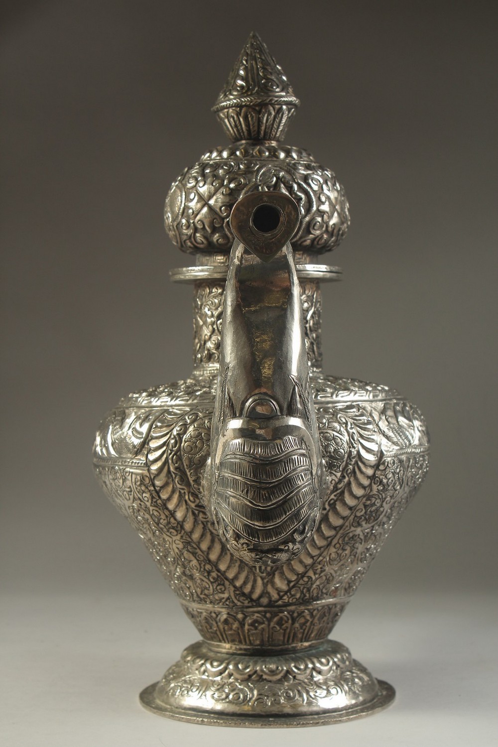 A LARGE CHINESE EMBOSSED AND ENGRAVED WHITE METAL LIDDED JUG, possibly low grade silver, decorated - Image 6 of 14