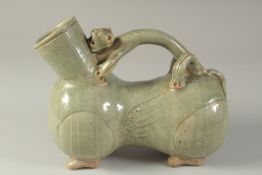 AN UNUSUAL CHINESE CELADON GLAZED POTTERY EWER / VESSEL, with zoomorphic handle, 21cm long.