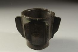 A RARE 14TH-15TH CENTURY SPANISH ADALUSIAN BRONZE MORTAR, with chased dotted designs, 10cm high.