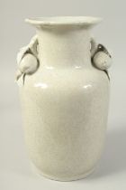 A LARGE CHINESE CRACKLE GLAZE TWIN HANDLE VASE, the handles moulded as fruits, 34.5cm high.