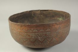 A LARGE 17TH CENTURY PERSIAN SAFAVID ENGRAVED COPPER BOWL, 29cm diameter.