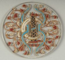 A FINE ISLAMIC OR EUROPEAN MAMLUK STYLE ENAMELLED GLASS ROUNDEL, depicting a central crescent with