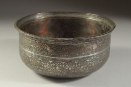 A FINE 18TH-19TH CENTURY INDIAN POSSIBLY DECCANI ENGRAVED TINNED COPPER BOWL, 20cm diameter.