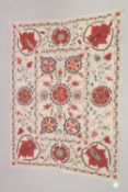 A FINE MID-EARLY 20TH CENTURY CENTRAL ASIAN SUZANI EMBROIDERED TEXTILE.