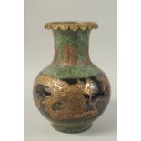 A CHINESE DAQING GILDED ENAMELLED GREEN DRAGON ZUN VASE, with ormolu rim, the base with character