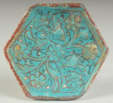 A FINE 13TH CENTURY PERSIAN KASHAN MINAIE GILDED TURQUOISE GLAZED HEXAGON TILE, 10cm at widest