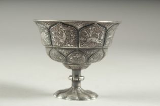 A VERY FINE CHINESE SILVER STEM CUP, embossed and chased with scenes of animals, 6cm high, 7.5cm