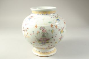 A CHINESE FAMILLE ROSE PORCELAIN VASE, decorated with vases, bats, and precious objects, character
