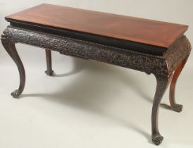 A VERY FINE 19TH CENTURY CHINESE HUANGHUALI ALTER TABLE, the frieze carved with foliate designs