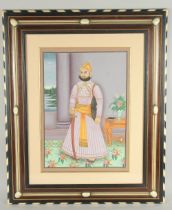 AN EARLY 20TH CENTURY PAINTING OF AN INDIAN RULER, framed and glazed, image 50cm x 35.5cm.