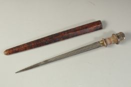 AN INDIAN MUGHAL DAGGER, with openworked silver and possibly snakeskin overlaid handle, the silver
