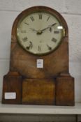 A walnut cased mantle clock.