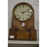 A walnut cased mantle clock.