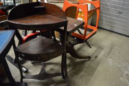 A mahogany table base and other items.