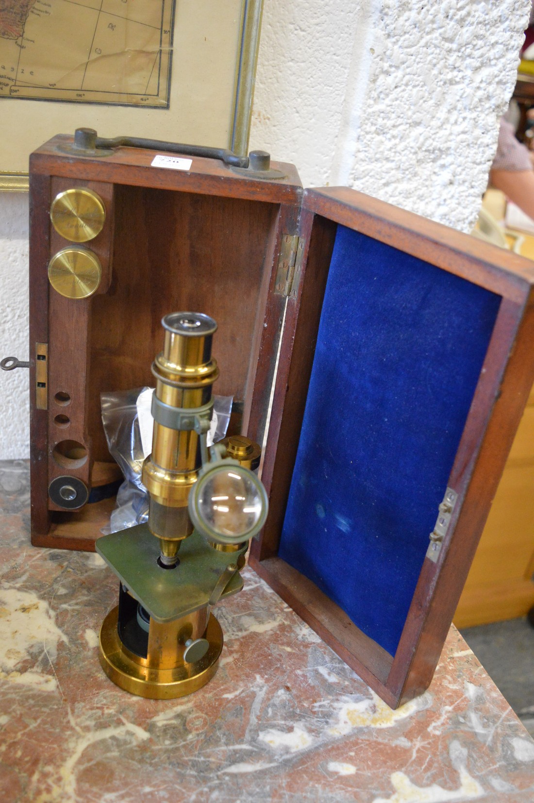 A Richebourg brass drum microscope with mahogany case.