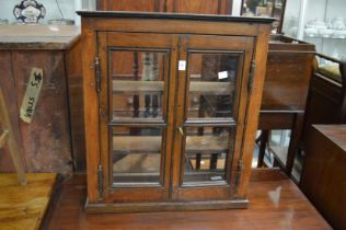 A hanging two door cabinet.